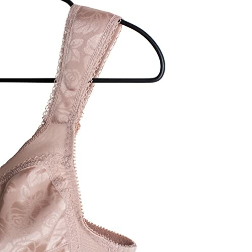 Beige bra with floral pattern on hanger