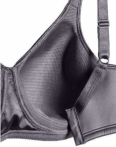 Close-up of a black bra showing fabric texture and strap detail.