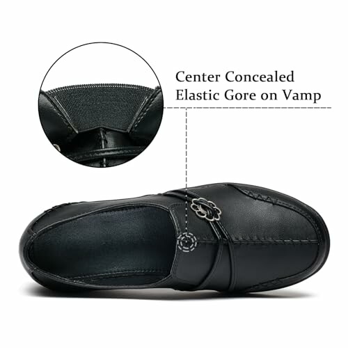 Black loafer shoe with center concealed elastic gore on vamp.