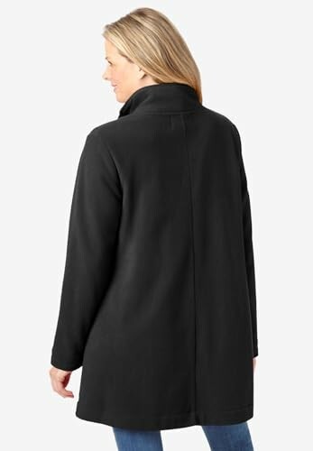 Woman wearing a black winter coat, back view.