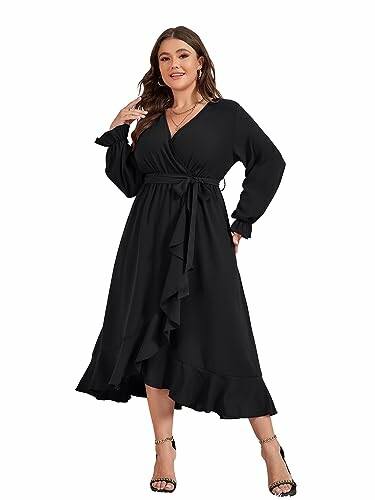 Woman in a black wrap dress with ruffled hem.