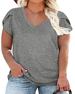 Woman wearing a casual grey V-neck T-shirt and jeans.