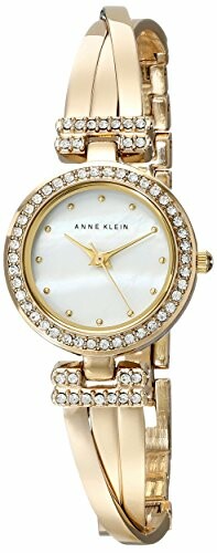 Elegant gold wristwatch with gemstone accents