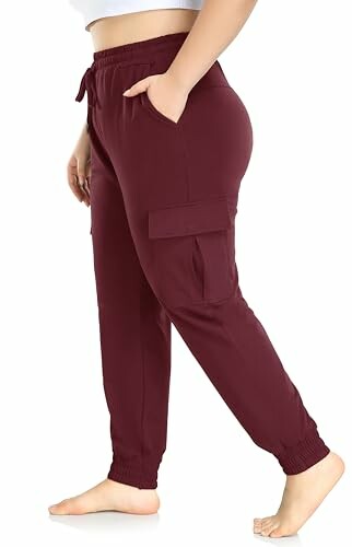 Person wearing maroon cargo pants with pockets