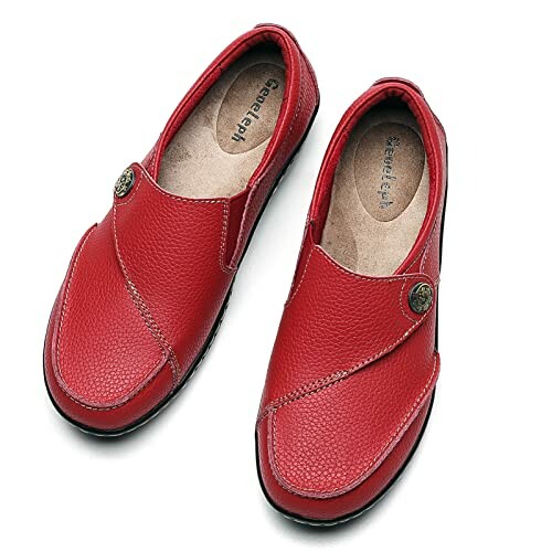 Red leather slip-on shoes with button detail