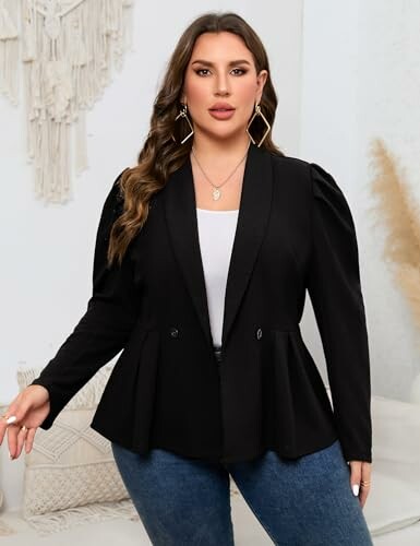 Woman wearing a black blazer and jeans