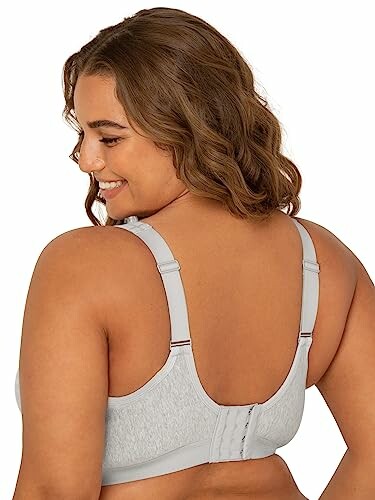 Woman in gray bra, back view